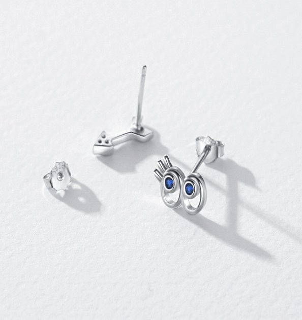 Perforated Design Whimsical Pupil & Dart Mismatched Stud Earring