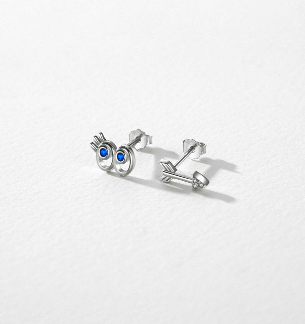 Perforated Design Whimsical Pupil & Dart Mismatched Stud Earring